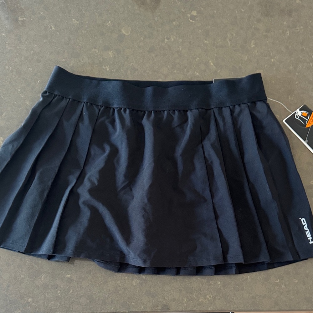 NEW WITH TAGS Head varsity pleated tennis skort in black w/inner shorts pockets
